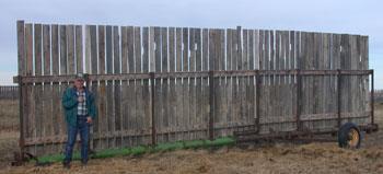 Discer frames salvaged and bolted together for bottom fence support